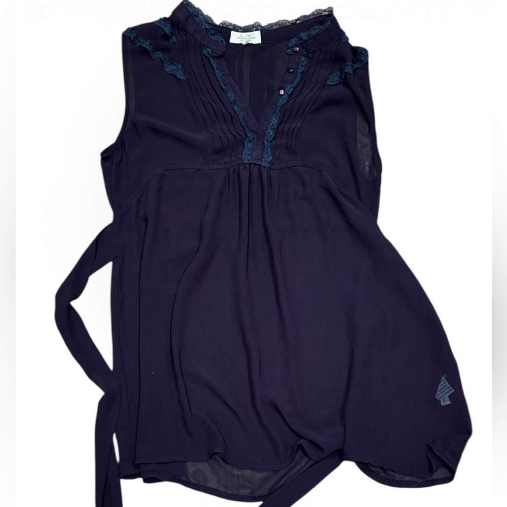 Sheer ruffled sleeveless blouse